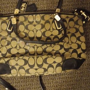 Brown and tan coach purse.